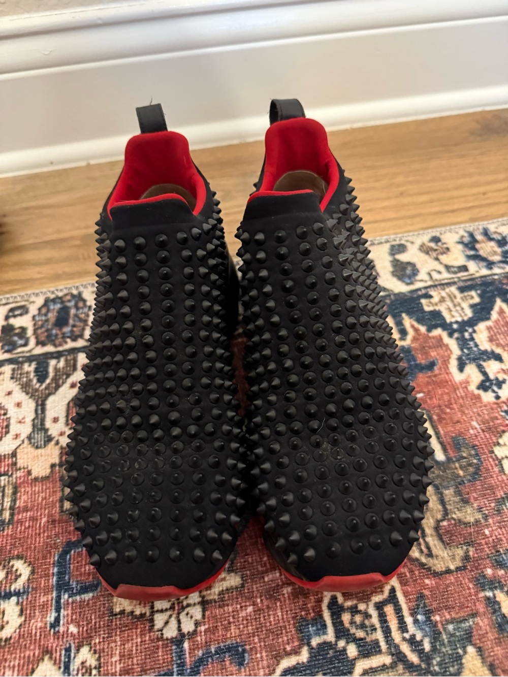 Christian Louboutin Black Studded Slip-On Sneakers with Red Interior